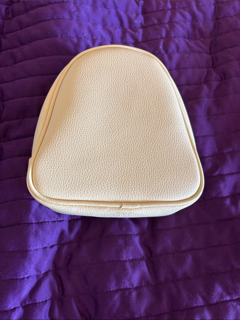 Yellow dog with floppy ears, a bone and heart collar makeup/travel bag